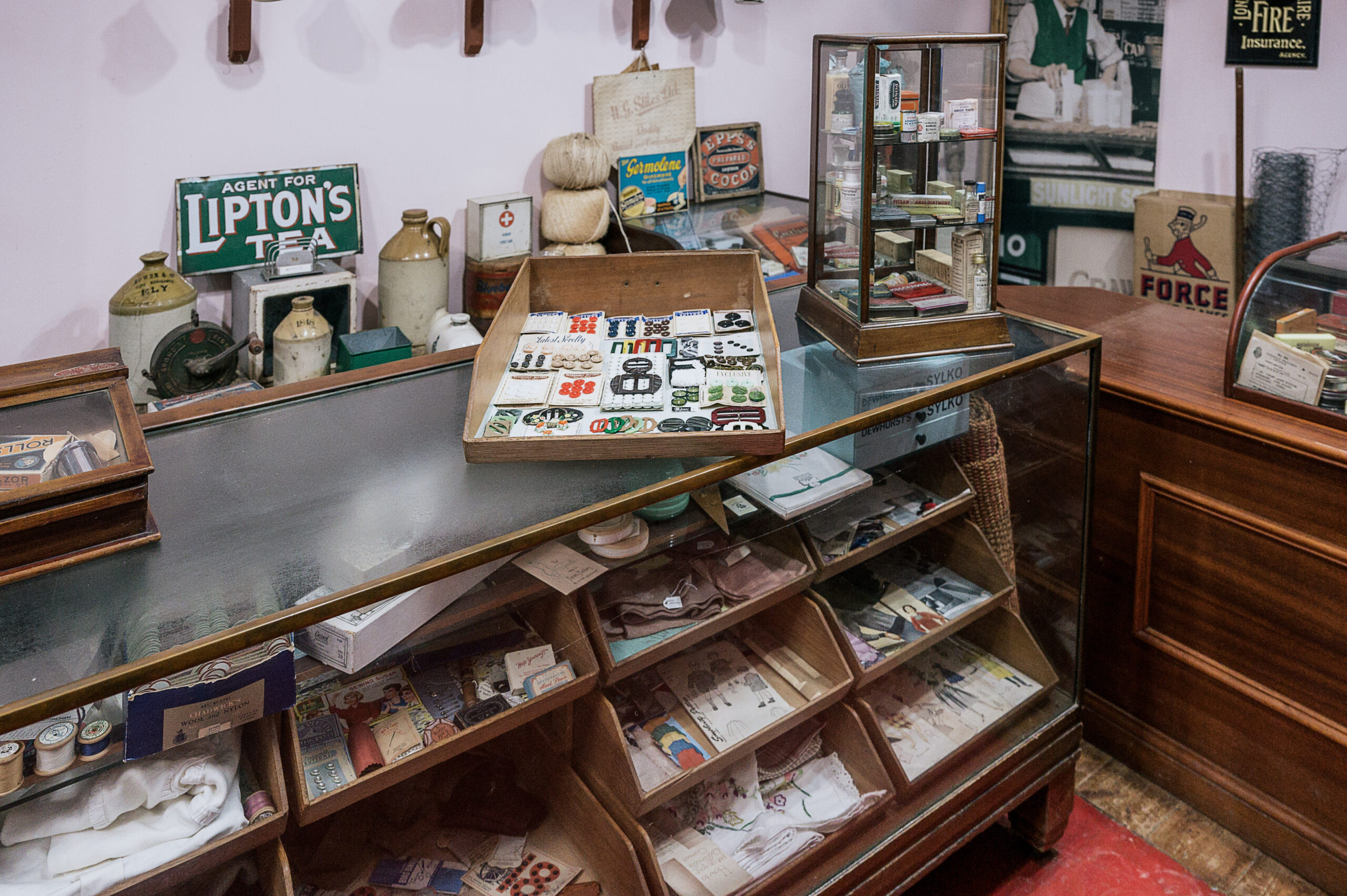 A display counter in a museum display of a 1940s village shop