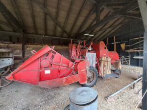 A red combine harvester