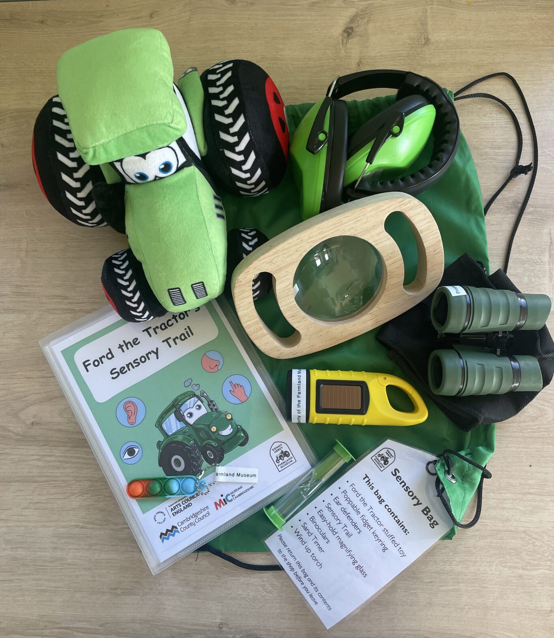 Contents of a museum sensory backpack, featuring items to help navigate the site .