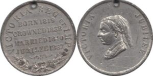 A clear version of the medallion, with Queen Victoria's Head on the right and text on the left stating 'Born 1819, Crowned 1838, Married 1840, Jubilee 1887'